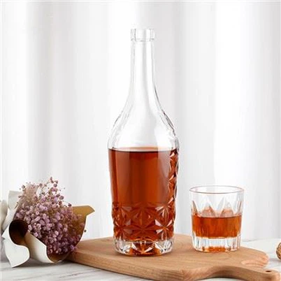 Graviruoti alkoholio buteliai